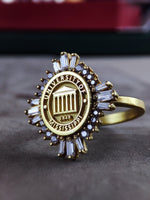 Load image into Gallery viewer, This custom gold-plated university ring is a delicate and timeless piece, crafted for women who appreciate elegance. A classic college signet ring that makes a meaningful graduation gift or alumni keepsake. Designed for daily wear or special occasions, this dainty ring adds a touch of sophistication to any jewelry collection.
