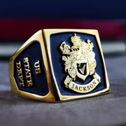 This square gold-plated family crest ring features a beautifully enameled coat of arms, creating a bold and unique signet piece. The personalized engraving adds a refined touch, making it an elegant heirloom for men. Perfect for those who value tradition and legacy, this ring is an excellent anniversary, birthday, or milestone gift, offering a blend of history and contemporary craftsmanship.