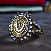 Custom university ring for women featuring a stone and a personalized design. A timeless keepsake for proud graduates and alumni.
