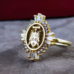 Load image into Gallery viewer, This custom-engraved heraldic ring is a sophisticated and elegant accessory for women who appreciate noble traditions. Designed as a timeless heirloom piece, this family crest ring is a tribute to ancestry. Whether as a personal statement or a thoughtful gift, this signet ring blends historical significance with modern elegance.
