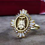 Load image into Gallery viewer, A timeless and meaningful family crest ring, designed for women who love historical and elegant jewelry. This signet ring is custom-engraved with a noble coat of arms, creating a unique piece that represents heritage and legacy. A sophisticated heirloom ring perfect for passing down through generations.
