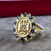 Women’s family ring with a custom engraved family crest in silver. This elegant piece is designed to symbolize lineage, making it a cherished addition to any jewelry collection.