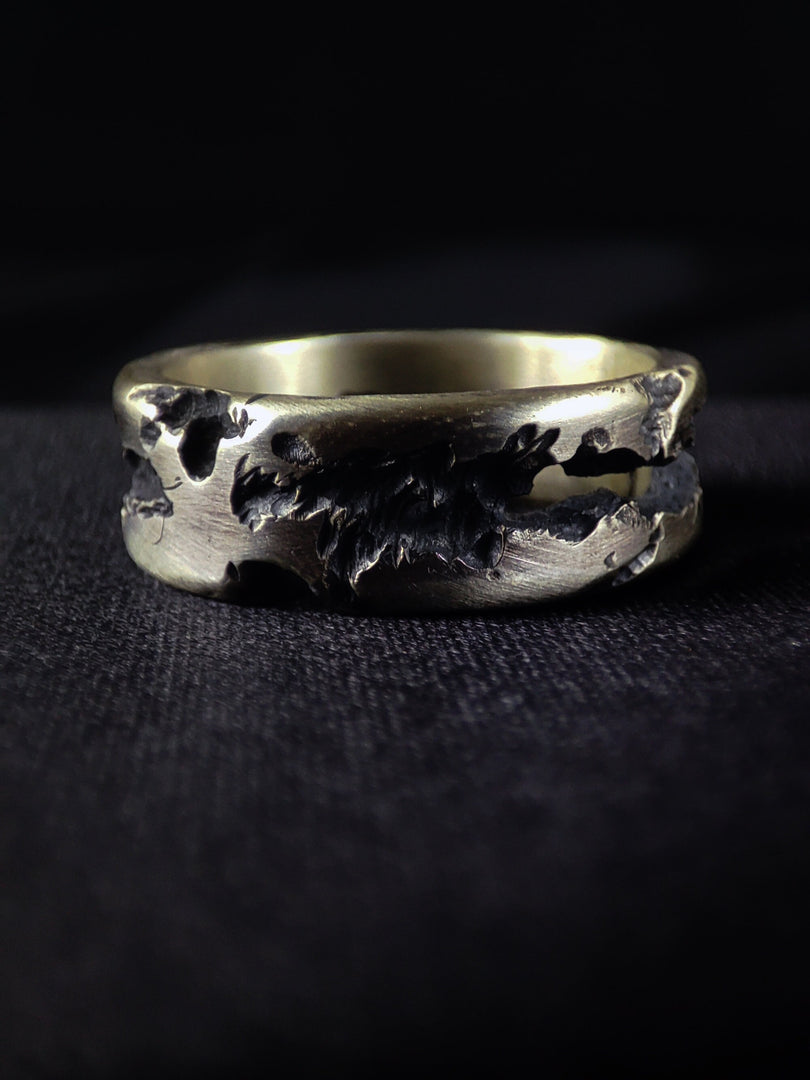 Rustic silver wedding ring with a unique, handcrafted design, perfect for personalized jewelry.