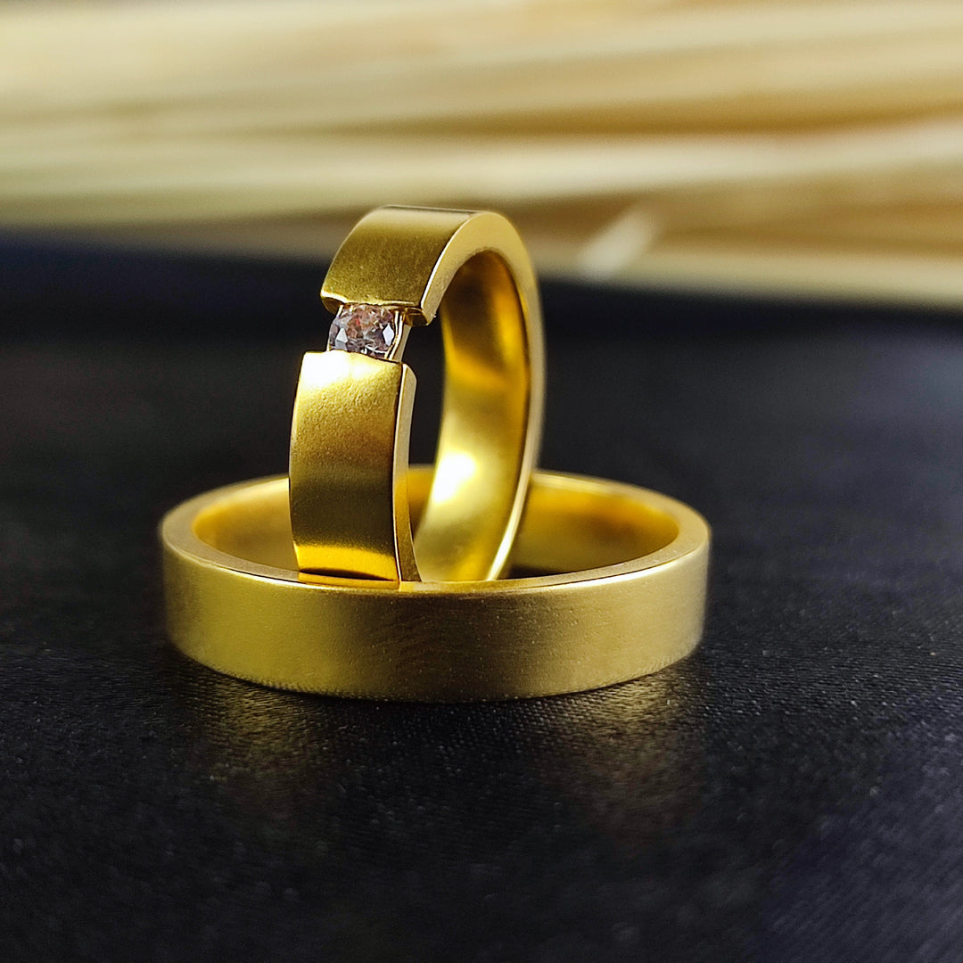 This gold vermeil wedding band set is designed for couples who want a perfect balance of luxury and simplicity. Crafted with a high-quality gold-plated finish, these engagement rings are timeless and elegant. Whether used as a promise ring, wedding band, or anniversary gift, they make a refined and heartfelt statement.