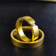 A stunning vermeil wedding band set crafted for couples celebrating their love and commitment. These matching engagement rings feature a high-quality gold-plated finish over sterling silver, offering durability and luxury. Whether as a promise ring or wedding band, this elegant and minimalist ring set is a sophisticated choice for couples who seek timeless romance.