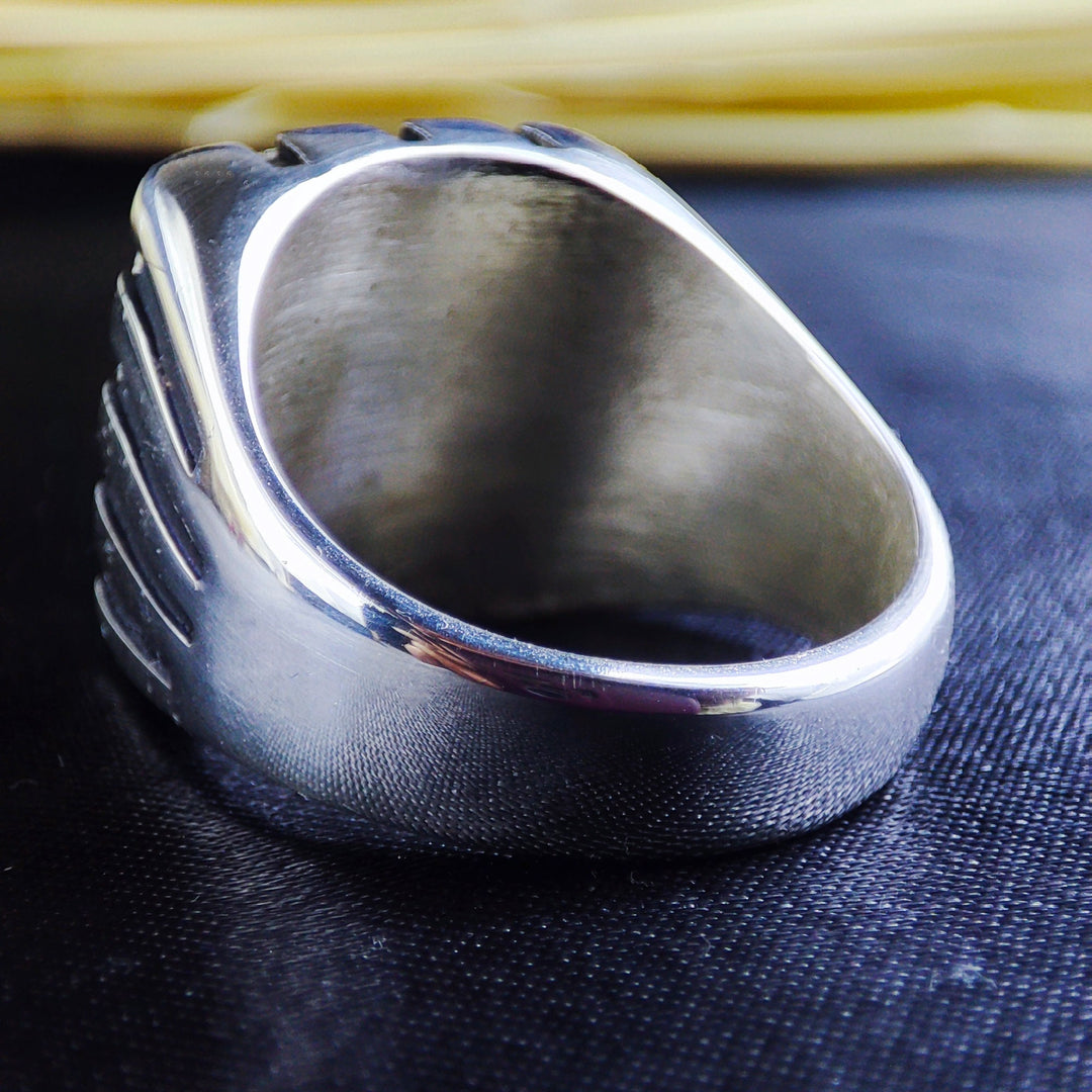 Honor your ancestry with this elegant square silver signet ring, featuring a family crest engraving or custom coat of arms. This heirloom-quality jewelry piece is crafted for men who value tradition and personal history. Whether as a commemorative piece or a meaningful gift, this ring serves as a distinguished and timeless addition to any gentleman&#39;s collection.