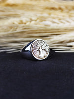 Load image into Gallery viewer, Nature-inspired Tree of Life ring in silver, designed to symbolize strength and resilience. This elegant ring is perfect for those who love meaningful jewelry.
