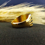Load image into Gallery viewer, Honor your family name with this personalized gold-plated crest ring, designed with a square signet face and deep engraving. This striking piece of jewelry is perfect for men who appreciate refined style and heritage. Whether worn at formal events or as a daily signature ring, it adds sophistication and timeless charm, making it a treasured heirloom gift.
