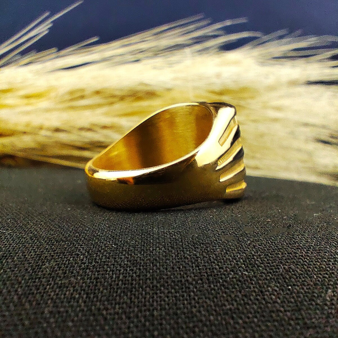 Honor your family name with this personalized gold-plated crest ring, designed with a square signet face and deep engraving. This striking piece of jewelry is perfect for men who appreciate refined style and heritage. Whether worn at formal events or as a daily signature ring, it adds sophistication and timeless charm, making it a treasured heirloom gift.