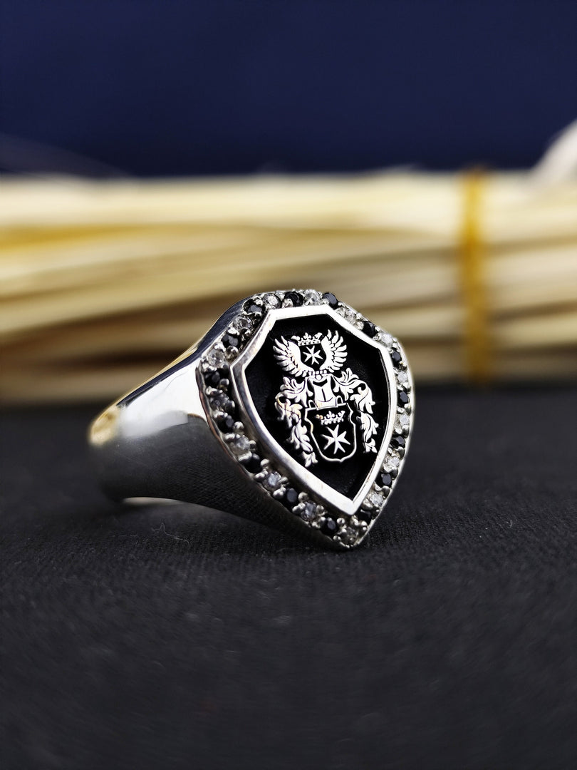Custom gold family crest ring engraved with a unique coat of arms. Perfect as a personalized keepsake, this ring adds a sophisticated touch to daily wear, honoring family legacy.