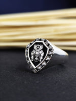 Load image into Gallery viewer, Unique family crest ring in silver, featuring custom coat of arms engraving. This meaningful piece is perfect for honoring family history, ideal for gifting or as an heirloom.
