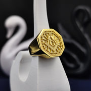 A bold and elegant octagonal Freemason signet ring, crafted in gold plating with a deep-engraved square and compass symbol. Designed to honor Masonic traditions, this lodge ring is perfect for those who value history and symbolism. Whether worn for formal occasions or daily wear, this custom Masonic jewelry piece embodies the timeless values of the fraternity.