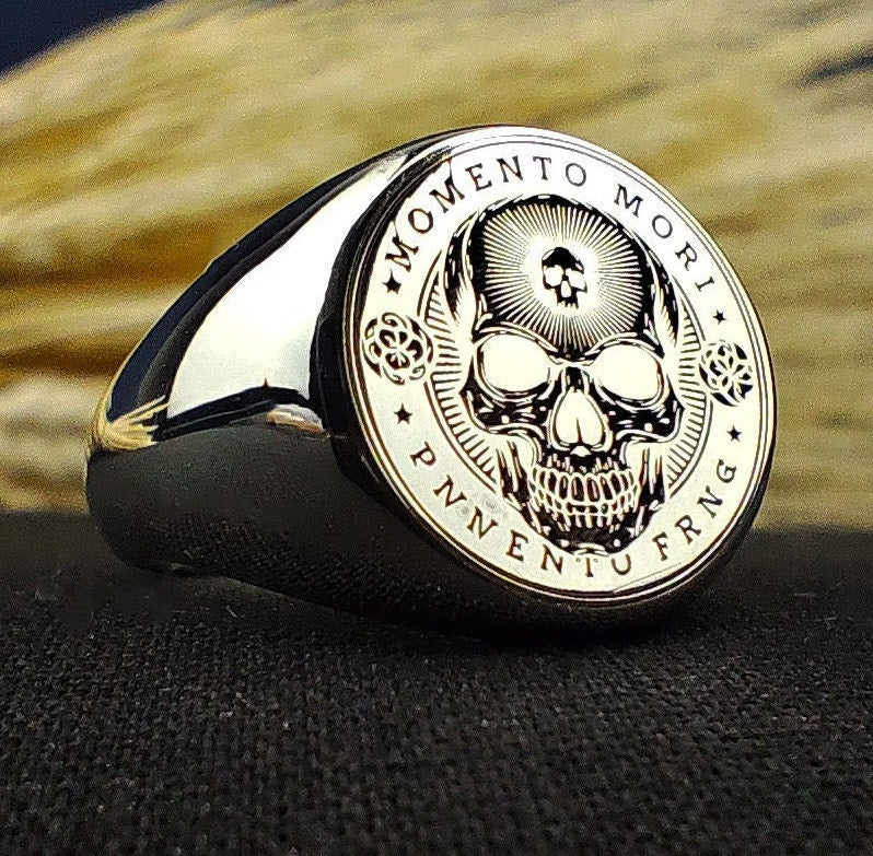 Handcrafted Memento Mori ring with personalized engraving options