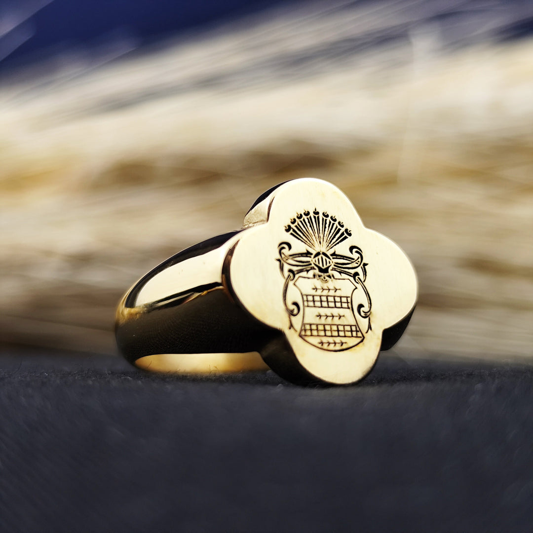This custom gold-plated family crest ring is a timeless keepsake, featuring a unique signet design with a recessed engraving. Crafted for men who appreciate luxury and tradition, this ring symbolizes strength and ancestry. Whether worn daily or reserved for formal occasions, it serves as an elegant heirloom that carries personal heritage and legacy.