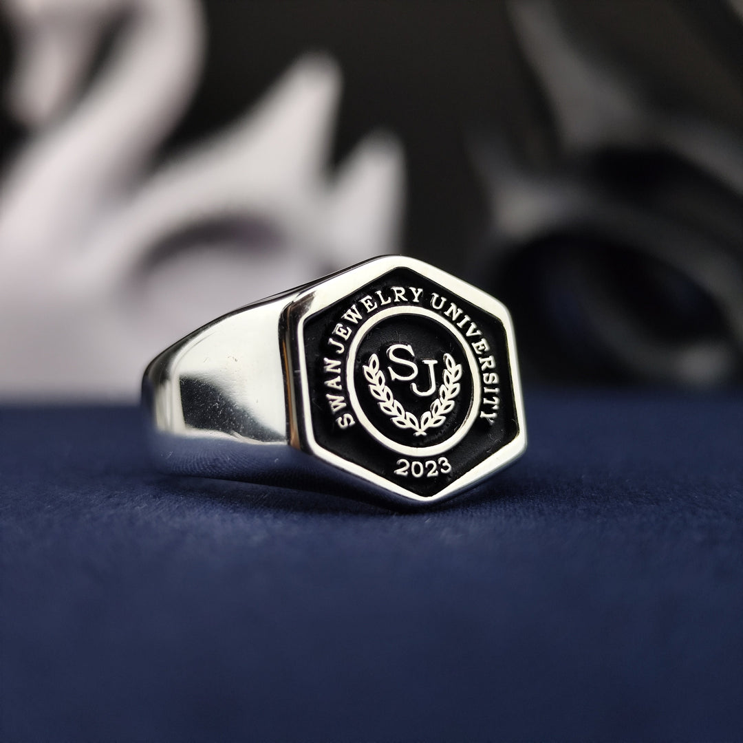 Elegant silver university ring for men, featuring a unique hexagonal design. A stylish accessory for daily wear or special occasions.