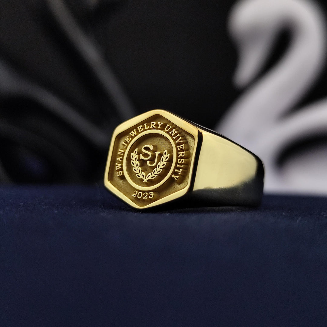 Personalized college graduation ring for men, crafted in a hexagonal gold-plated style. A sophisticated accessory for academic pride.