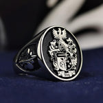 Load image into Gallery viewer, Custom silver family crest ring, engraved with your unique coat of arms. Perfect for those who value heritage and want a timeless piece of jewelry.
