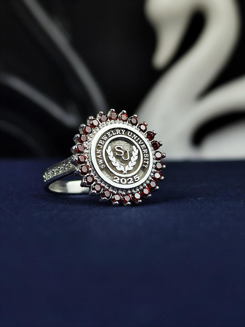 Custom silver university ring for women with a polished round design, blending simplicity and elegance. A perfect choice for marking graduation milestones and creating a lasting memory for proud alumni.