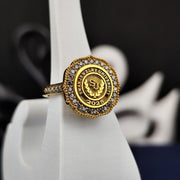Elegant gold-plated university ring for women, featuring a polished white stone. This stylish accessory is ideal as a graduation gift or keepsake for alumni.