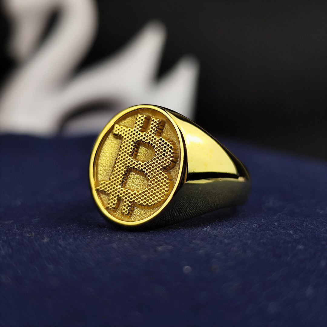 Custom gold Bitcoin ring, designed with a high-quality finish. An ideal gift for cryptocurrency traders and digital finance advocates looking for a stylish statement piece.