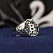 Sleek silver Bitcoin signet ring, crafted for those passionate about blockchain technology and digital finance. A timeless and meaningful crypto accessory.