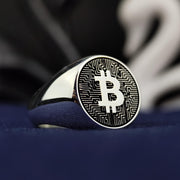 Stylish silver Bitcoin signet ring with a modern design, perfect for cryptocurrency investors and blockchain enthusiasts. A sleek and sophisticated accessory representing digital wealth and innovation.