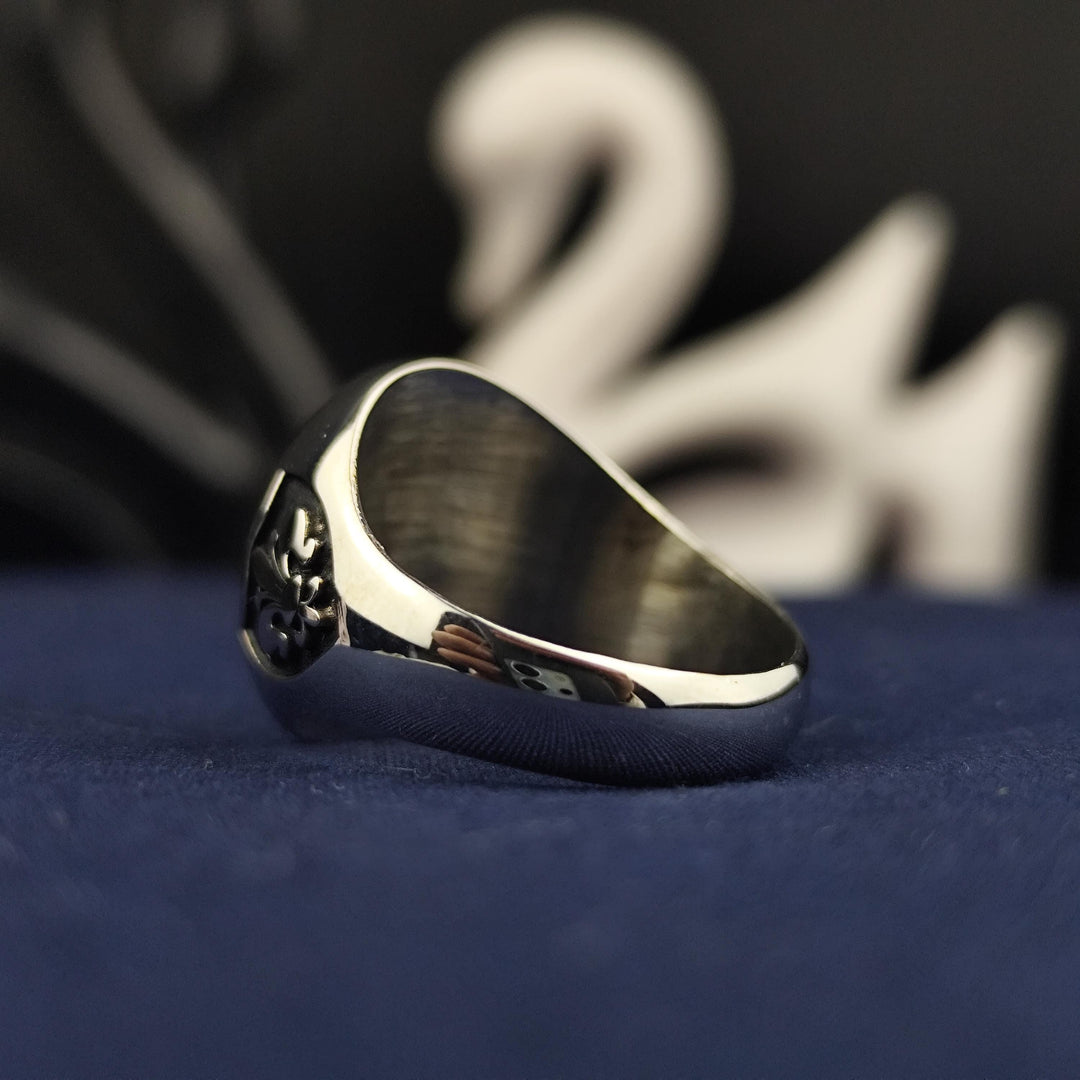 Silver initial ring with a sleek oval design, created for both men and women. This custom ring makes a thoughtful keepsake or gift for any occasion.