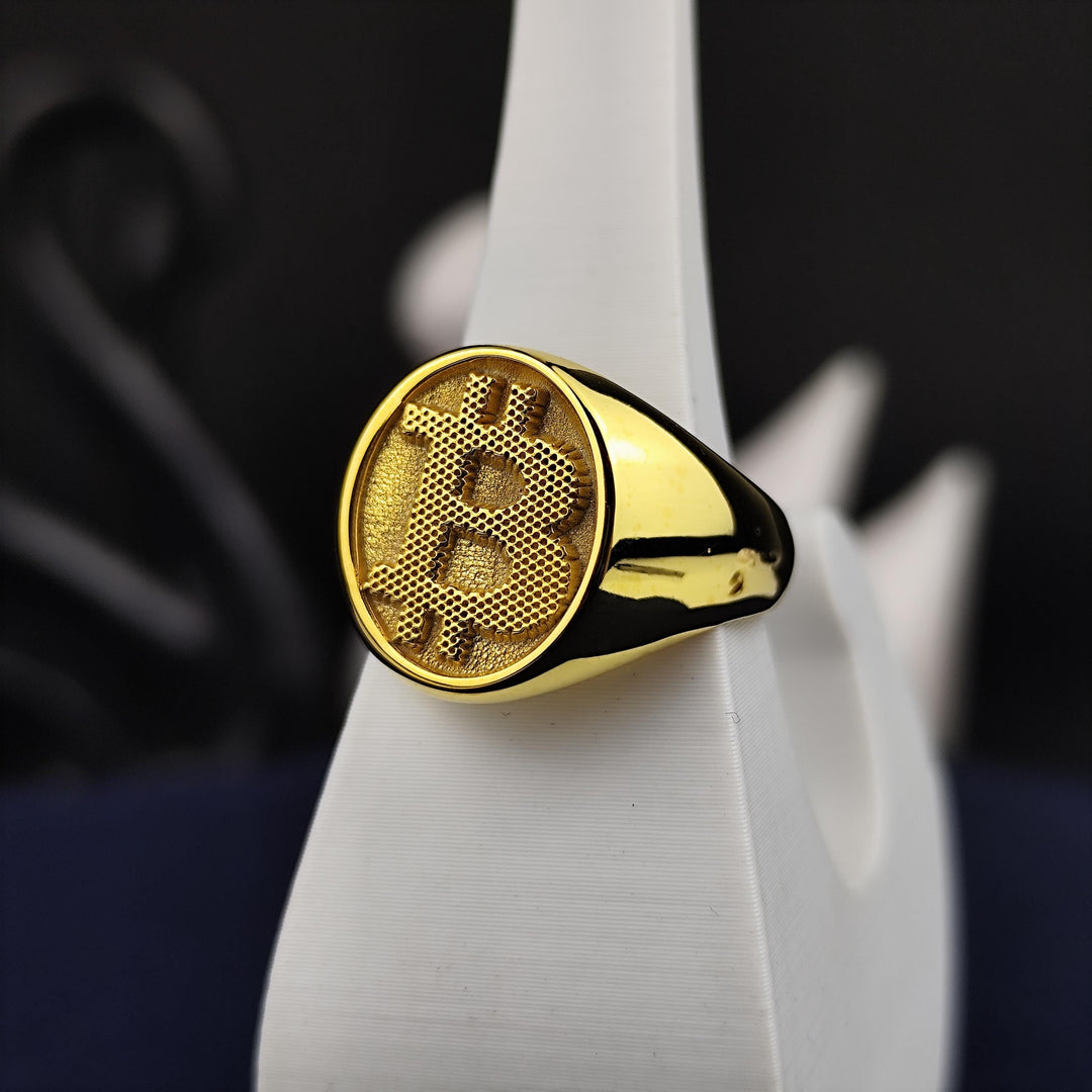 Sleek Bitcoin ring with an elegant gold design, perfect for expressing your support for blockchain technology and cryptocurrency investments.