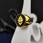 Load image into Gallery viewer, Premium-quality gold Ethereum signet ring with a polished finish, symbolizing the evolution of finance and blockchain technology. Designed for men and women who appreciate stylish crypto jewelry, this unique piece celebrates Ethereum’s impact on the world of decentralized investments. A timeless crypto gift, representing financial empowerment and the future of digital currency.
