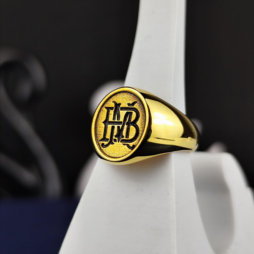 This custom two-letter ring is a striking blend of personalization and craftsmanship. Designed in silver or gold, this initial signet band is perfect for anyone looking to wear their name or initials stylishly. Ideal for gifting on special occasions, this alphabet-inspired jewelry is a timeless statement of love, identity, or legacy, making it a sentimental yet fashionable accessory for men and women.
