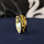 Load image into Gallery viewer, A handmade rustic ring with a unique oxidized and gold-plated finish, perfect for lovers of artistic and vintage jewelry. This textured statement band features an aged, distressed look, adding character and charm to any outfit. Whether worn as an everyday accessory or given as a meaningful gift, this unisex ring embodies raw beauty and craftsmanship, making it an elegant yet bold fashion piece.
