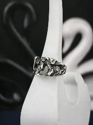 Chunky sterling silver brutalist ring with organic openwork texture
